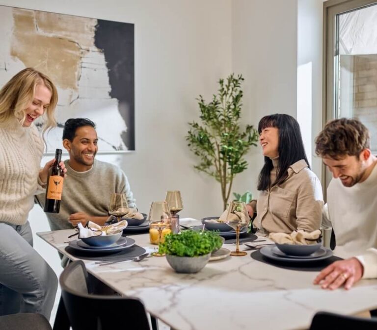 Two couples dining