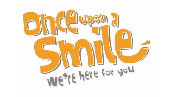 once upon a smile logo
